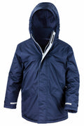 Introducing the Result Core R207J: a navy blue hooded winter jacket featuring a front zipper and Velcro closure. It is designed with two large front pockets, adjustable cuffs, and a high collar for enhanced warmth. This jacket offers insulated, weather-resistant protection.