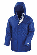 The R207X by Result Core is a blue hooded winter jacket with a zipper and velcro closure, featuring two front pockets and adjustable velcro cuffs.