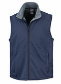 The Result Core R214X is a navy blue vest featuring a zip-up design, high collar, and side pockets.