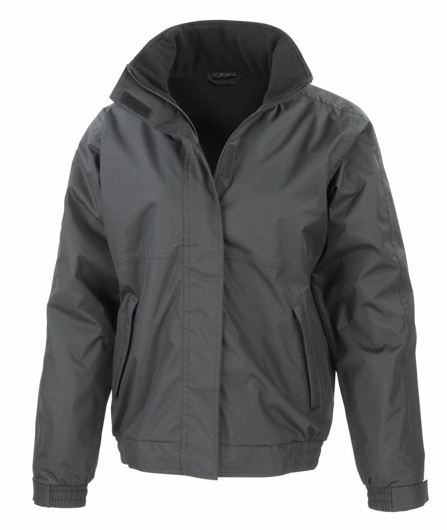 Result Core's R221M is a dark gray jacket featuring long sleeves, a high collar, two front pockets, and a convenient zipper closure.