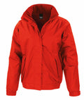 The Result Core R221M is a vibrant red jacket featuring a high collar and zippered front, two side pockets, and a fitted waistline, perfect for casual or outdoor wear.