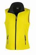 The Result Core R232F is a vibrant yellow sleeveless vest featuring a black zippered front, black inner lining, and two zippered pockets.