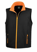 A black sleeveless vest from Result Core, model R232M, featuring an orange zipper and collar, along with two front pockets equipped with orange zippers.