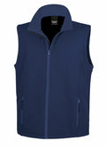The Result Core R232M is a sleeveless vest in navy blue, featuring a high collar and front zipper. It includes two zippered pockets on either side. The fabric has a smooth texture, offering a simple and functional design.