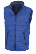 The Result Core R234J is a blue puffer vest designed with a high collar and front zipper closure. It includes two zippered pockets on the front and features quilted stitching for added insulation.