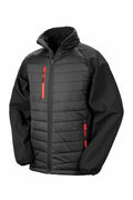 The Result Genuine Recycled R237X black puffer jacket, featuring contrast fabric sleeves and eye-catching bright red zipper accents on the chest and pockets, is showcased against a white background. This jacket comes with a high collar and elastic cuffs.