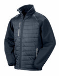 Introducing the R237X by Result Genuine Recycled: This stylish dark gray zip-up jacket features quilted panels on the front and smooth fabric on the sleeves and sides. It comes equipped with a high collar, a zipper closure, and zippered pockets on both the chest and sides for added convenience.