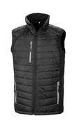 The R238X by Result Genuine Recycled is a black puffer vest featuring a high collar, front zipper, and three zippered pockets.