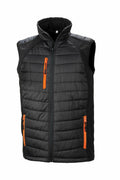 Introducing the R238X by Result Genuine Recycled: a sleek black puffer vest featuring a high collar and striking orange zipper accents. This sleeveless vest includes a front zipper closure and two zippered pockets at the front, complemented by its stylish quilted design.