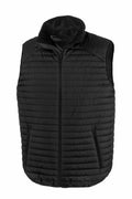The R239X by Result Genuine Recycled is a black quilted puffer vest featuring a full zip closure and two zippered pockets, displayed on a plain white background.