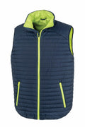 Introducing the Result Genuine Recycled R239X, a stylish navy blue puffer vest featuring lime green lining and zipper accents. This vest is designed with a high collar and two zippered front pockets, offering both warmth and style.