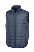 The R244X by Result Core is a navy blue puffer vest that features a sleeveless design, a zip-up front, and side pockets.