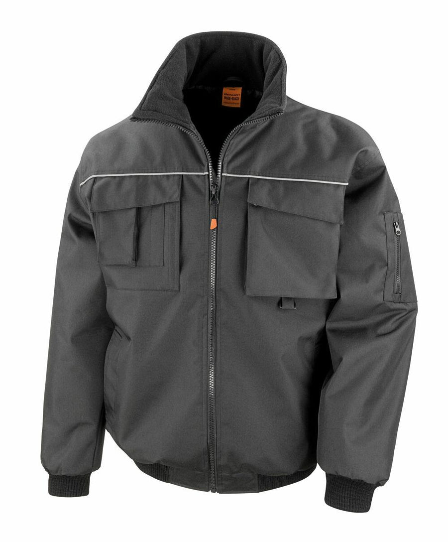 The R300X utility jacket by Result Work-Guard features a front zipper, multiple pockets, and ribbed cuffs and waistband in black.