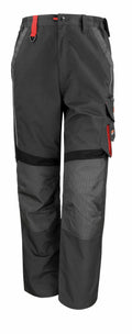 A pair of Result Work-Guard R310X cargo pants in dark gray, featuring reinforced knees and red accents.