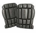 Two black R322X knee pads with segmented padding, featuring the "Result Work-Guard" text imprinted on them.