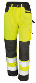 The R327X by Result Safe Guard are yellow and black work pants featuring reflective strips on the lower legs and multiple pockets.