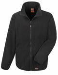 The Result Work-Guard R330X is a black zip-up fleece jacket featuring a high collar, two side pockets, and elastic cuffs.