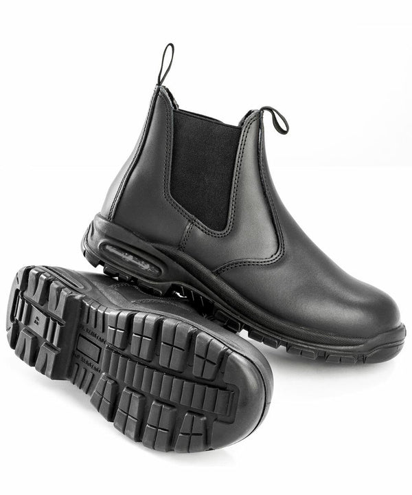 A pair of black leather Result R460X Chelsea boots with elastic side panels and pull tabs. One boot is upright while the other is on its side, displaying its treaded rubber sole.