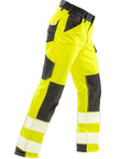 Trousers in neon yellow with black accents feature reflective stripes on the lower legs, multiple pockets, and reinforced knees for high visibility and durability.