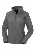 The R901F by Result Genuine Recycled is a gray zip-up jacket, featuring a high collar and long sleeves. The jacket includes side pockets with zippers and elastic cuffs, made from smooth fabric with a slightly fitted design.