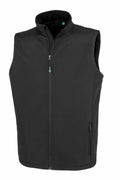 The R902M by Result Genuine Recycled is a black vest featuring a sleeveless design, a front zipper, and two zipped pockets.