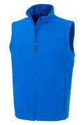 Displayed against a white background is the R902M by Result Genuine Recycled, featuring a blue sleeveless design, front zipper, and two side pockets.