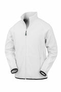 The R903X jacket by Result Genuine Recycled is a white zip-up featuring black trim on the cuffs and hem. It boasts a high collar and side pockets, complemented by a green zipper pull for contrast. The jacket is showcased against a plain white background.