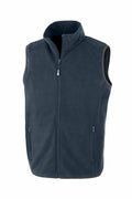 The Result Genuine Recycled R904X is a dark gray sleeveless fleece vest featuring a front zipper and two zippered pockets.