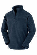 The R905X from Result Genuine Recycled is a navy blue fleece pullover featuring a half-zip closure and long sleeves. Crafted for colder weather, the fabric is soft and warm. It has a slightly raised collar, offering a simple and casual design.
