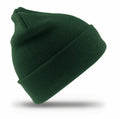 A green knit beanie hat with a folded brim from the Result Winter Essentials brand, model RC029, is displayed against a white background.
