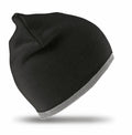 An RC046 beanie from Result Winter Essentials, featuring a black color with a light gray trim at the bottom, displayed against a white background.