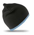 The Result Winter Essentials RC046 is a stylish black beanie featuring a light blue trim around the edge, showcased against a plain white background.