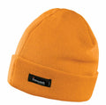 Orange RC133 knit beanie by Result Winter Essentials with a black Thinsulate tag on the turned-up brim, displayed against a white background.