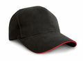 The RC25P by Result Headwear is a black baseball cap featuring a red trim along the edge of the brim.