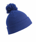 Introducing the RC28J by Result Winter Essentials: a stylish blue knitted beanie featuring a playful pom-pom on top and a folded brim for enhanced warmth and flair.