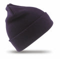 A RC29J beanie from Result Winter Essentials, featuring a dark navy blue color and a folded cuff, is displayed against a white background. It boasts a straightforward ribbed knit texture and a pointed top for a relaxed and snug look.