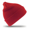 A vibrant red knit beanie hat from Result Winter Essentials, model RC29J, is showcased against a plain white background. The hat is slightly angled to highlight its texture and striking color.