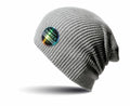 A gray ribbed beanie features a holographic circular patch with the branding of Result Winter Essentials and the text BEANIE DUDE. The beanie, model RC31X, is showcased on a white background with a soft shadow beneath it.