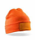 RC34X beanie by Result Winter Essentials in orange, featuring a blank rectangular patch on the front, displayed against a white background.