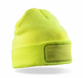 RC34X by Result Winter Essentials is a bright yellow knitted beanie featuring a blank rectangular patch on the front, set against a white background.