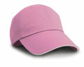 A pink RC38X baseball cap from Result Headwear, featuring a curved brim and soft, textured fabric, set against a white background.