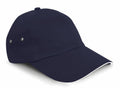 A Result Headwear RC72X baseball cap in dark blue, featuring a white trim on the brim and ventilation eyelets on the side.