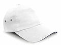 The RC72X by Result Headwear is a plain white baseball cap with a curved brim and two small ventilation holes on the side, shown from a three-quarter angle. It showcases slightly textured fabric and is highlighted by a dark trim along the edge of the brim.