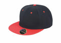 Introducing the RC82X by Result Headwear, a stylish black snapback cap designed with a striking red brim and red button on top. This cap features small red eyelets and is adorned with a gold branded sticker on the brim.
