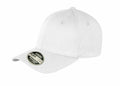 A plain white RC85X baseball cap from Result Headwear with a curved brim, featuring a small sticker on the brim displaying the brand and size details. The cap is shown at an angle, highlighting both the front and partially the side.
