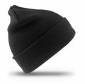Result Genuine Recycled's RC929, a black knit beanie with a folded brim, is elegantly displayed against a white background.