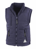 The Result RE88J is a navy blue sleeveless padded vest featuring a front zipper, two zippered chest pockets, and two side pockets.