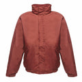 The RG045 by Regatta Professional is a red jacket featuring a high collar, long sleeves, and a waterproof design. It includes two front pockets and a zipper, with fabric that boasts a smooth, shiny texture.