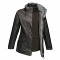 A dark green RG111 waterproof jacket by Regatta Professional, featuring a gray hood and a zip-up front, displayed open to showcase its dark inner lining.