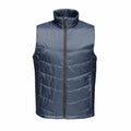 The RG113 is a sleeveless puffer vest in navy blue from Regatta Professional, featuring a full-length zipper.